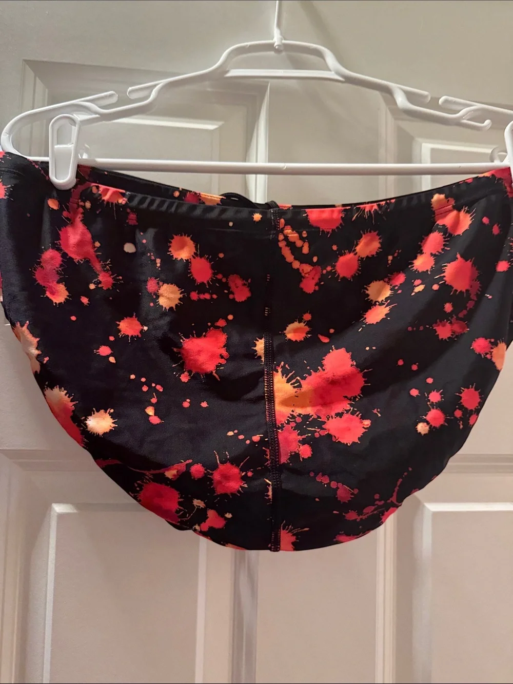 Nike Men’s Black Swim Briefs with Red and Orange Splatter Size 38.